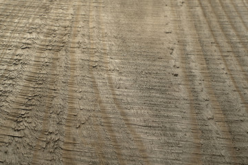 High angle view dark brown rough surface of rustic natural and untreated  wooden board for texture and background. Old rough lumber with vertical pattern.