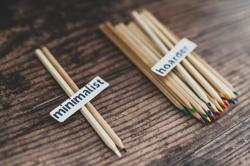 minimalist vs hoarder lifestyle, 2 tidy pencils vs messy group of all colors