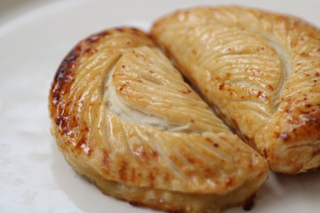 zoomed in apple turnover with feather pattern