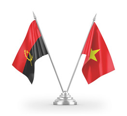 Vietnam and Angola table flags isolated on white 3D rendering