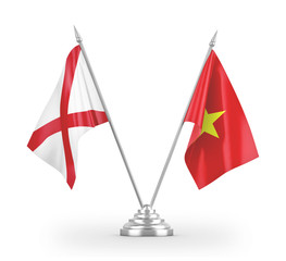 Vietnam and Northern Ireland table flags isolated on white 3D rendering