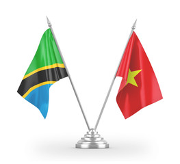 Vietnam and Tanzania table flags isolated on white 3D rendering