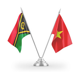 Vietnam and Vanuatu table flags isolated on white 3D rendering