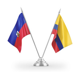 Colombia and Haiti table flags isolated on white 3D rendering