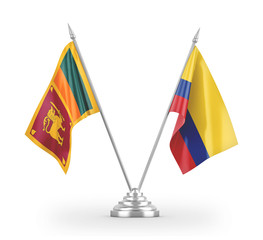 Colombia and Sri Lanka table flags isolated on white 3D rendering