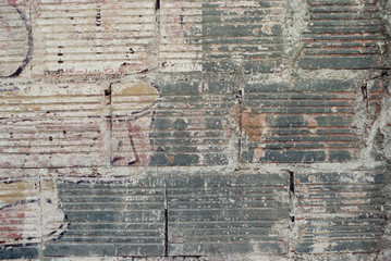 Beauty in ugly things, brick wall in a village