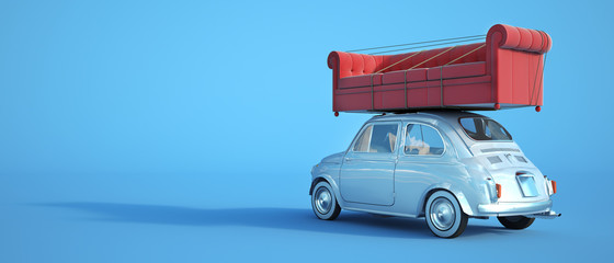 Small car with big sofa on the roof