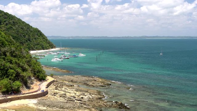 Yatchs, Schooners, and other luxury boats parked at paradisiac Ilha dos Frades beach, near Salvador, Bahia, Brazil
