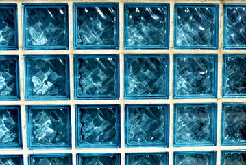 Blue glass bricks background. Blue glass bricks texture.