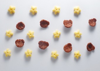 Variety breakfast cereal on white table