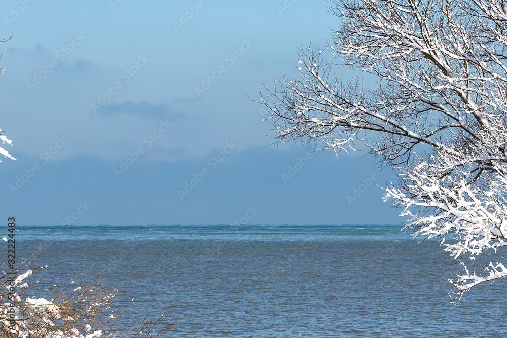 Wall mural  The shore of Lake Michigan cover fresh snow