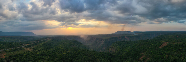 Bald Mountain is caused by invasion of upstream forests in southern Laos, causing global warming...