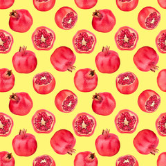 Seamless pattern of red pomegranates on yellow background isolated close up, whole and cut pomegranate with seeds repeating ornament, detox diet backdrop concept, antioxidant garnet fruits wallpaper