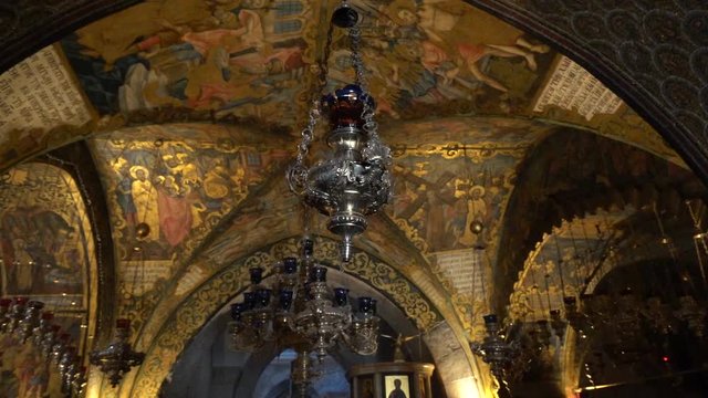 Zoom in chandelier inside jerusalem church