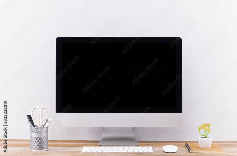 Poster blank screen computer, desktop pc. for business on work table front view