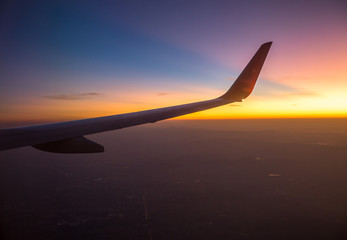 Obraz premium Blurred abstract background of high angle views from the plane window,can see the natural atmosphere during the air travel (mountains,rivers,morning light)