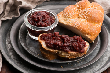 Sweet bread (challah) with cherry jam