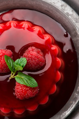 Vanilla pudding with raspberry and raspberry sauce