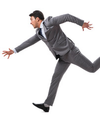 Young businessman running forward isolated on white