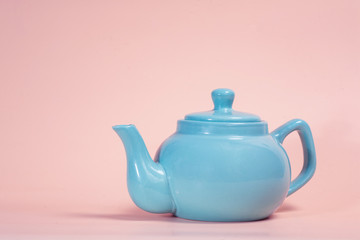 Elegant retro ceramic and clay teapot for brewing tea and steaming herbs for weight loss