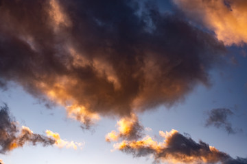 Evening sky with black clouds. Evening sky with white clouds.