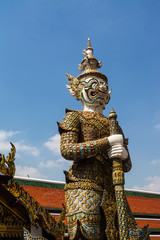 The giant in Wat Phra Kaew that is the most sacred Buddhist temple in Bangkok Thailand.