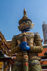 Fototapeta premium The giant in Wat Phra Kaew that is the most sacred Buddhist temple in Bangkok Thailand.