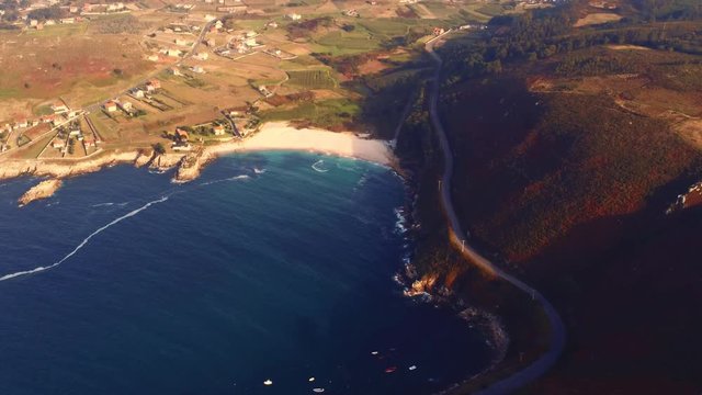 Beautiful view of Barizo beach and surroundings. Aerial, tilt up