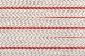 Fabric striped texture. Rustic canvas pattern. Colored striped coarse linen fabric closeup as...