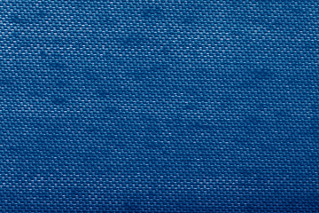 Fototapeta na wymiar Background of blue textile texture. Seamless pattern. Macro photo
