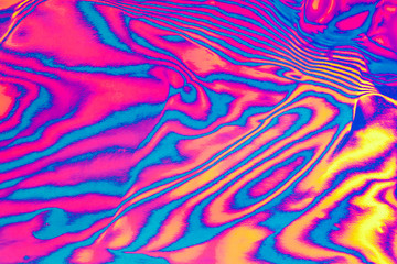 Abstract trendy neon colored psychedelic fluorescent striped zebra textured neon background