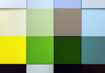 background of samples of different colors of plastic or melamine panels. Wall of colored panels