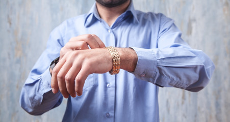Man with a expensive bracelet. Fashion accessories and jewelry