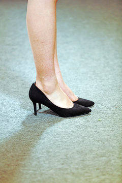 Foot in black high heels