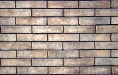 Obraz premium Gray brick texture. Close-up. There is a small relief on the bricks