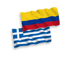 National vector fabric wave flags of Greece and Colombia isolated on white background. 1 to 2 proportion.