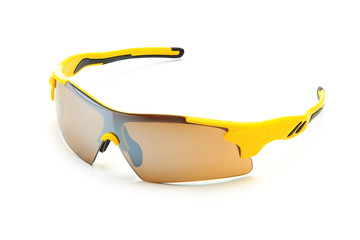 Modern stylish yellow sports bike sun glasses with smoky lenses isolated on white background