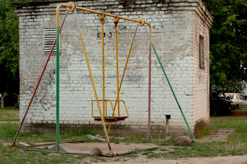 Old empty swing, lonely.