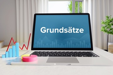 Grundsätze – Business/Statistik. Laptop im Büro mit Begriff auf dem Monitor. Finanzen/Wirtschaft.