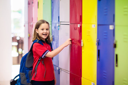 Student In School At Locker. Kids In Preschool.