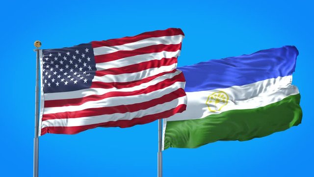 Bashkortostan and United States flag waving in deep blue sky together. High Definition 3D Render.