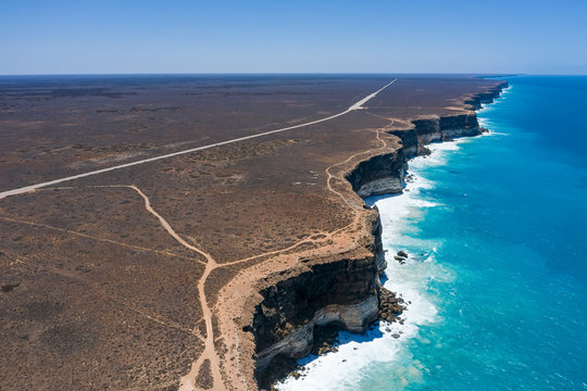 View of the cliffs and Eyre Highway at the Great Australian Bight close to the Nullarbor Cliffs lookout