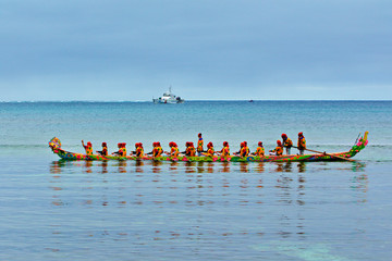 LY SON ISLAND, QUANG NGAI, VIETNAM - JANUARY, 28th 2020: Local fishermen rehearsing for a traditional boat race around the island. This is a common practice at the beginning of the new year.