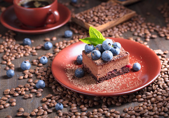 Chocolate cake with blueberries and mint.