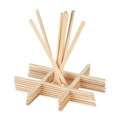 Wooden stirrers for coffee, tea and drinks, laid out in a beautiful order, isolated on a white background.