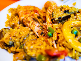 Paella seafood on wooden background