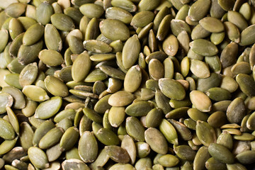 peeled pumpkin seeds, macro shot