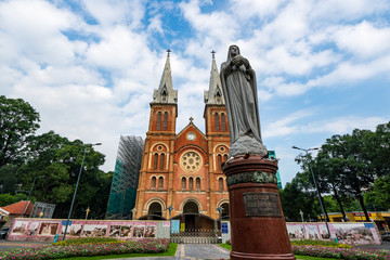 Statue of virgin mary and Notre-Dame Cathedral Basilica of Saigon