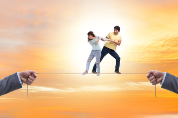 Young family on tight rope