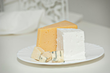Different types of cheese on a plate